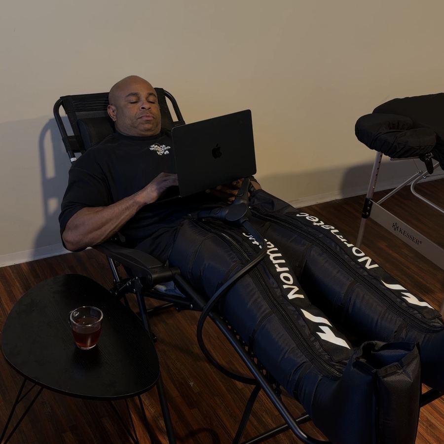 Compression boots while working on a laptop